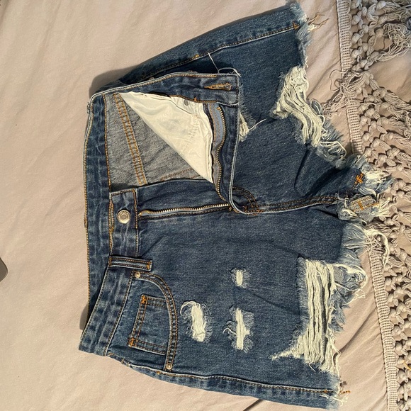 Medium wash ripped jean shorts size small (4) - Picture 3 of 3